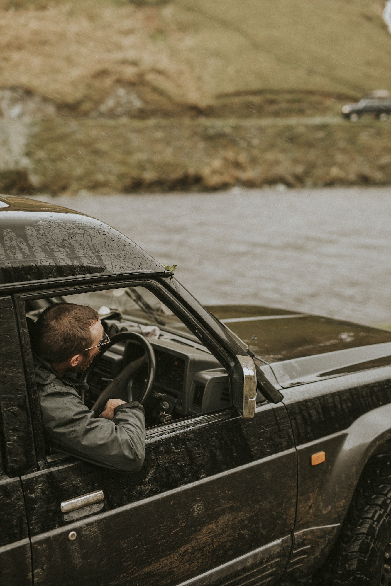 Driver looking at a another car in the distance